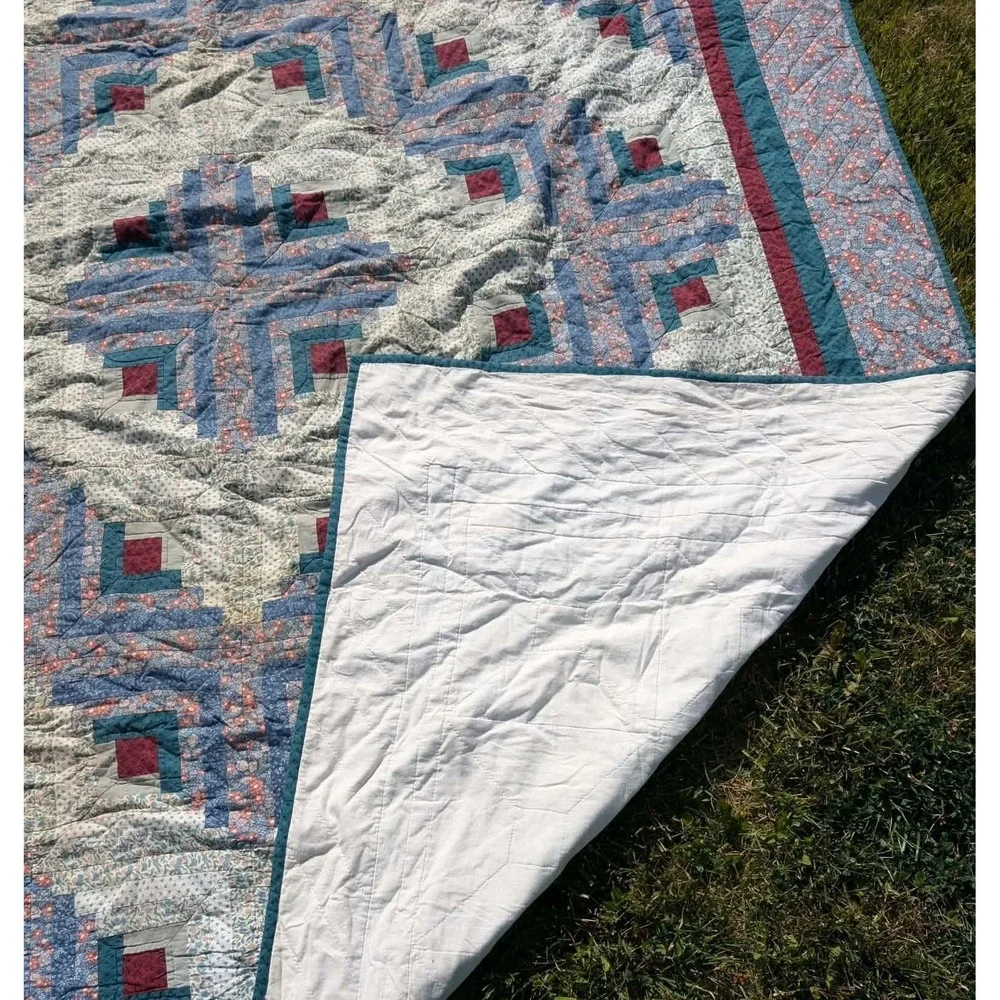 6. Machine stitched quilt Queen size. There may be some staining. Needs a soak
